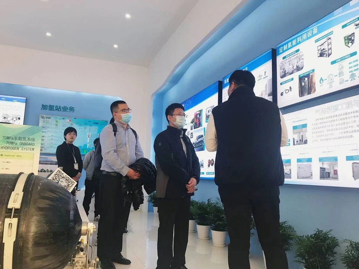 Tianjin Port Free Trade Zone's Xu Haitao and Hirano Environmental's Hu Huiling visit Sunwise — original image